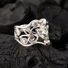 Ivana light green gemstone filigree ring in sterling silver with marquise cut center stone and swirl filigree details