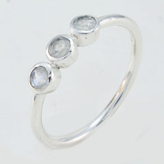 Yuki sterling silver light green gemstone trilogy ring with three bezel set round stones delicate band