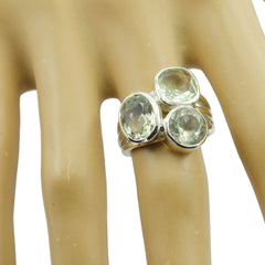 Nora light green gemstone trilogy ring with three light green gemstones set in silver band