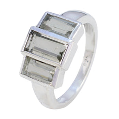 Natcha silver ring featuring a light green gemstone trilogy ring design with rectangular stones