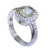 Chen light green halo ring with round prong set center stone and pave diamond band in white gold