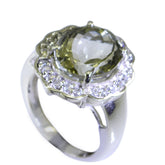 Natcha light green halo ring with round center stone and sparkling white accent stones