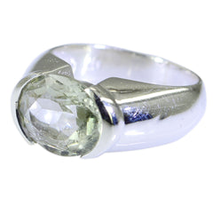 Liyana light green solitaire ring with oval faceted gemstone set in polished silver band