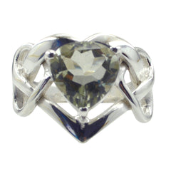 Kennedy light green solitaire ring with heart-shaped gemstone and silver twisted band