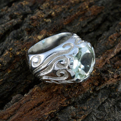 Sarah Light Green Solitaire Ring with Intricate Silver Design