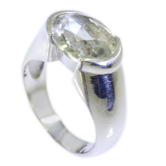 Liyana light green solitaire ring with oval gemstone set in polished silver band