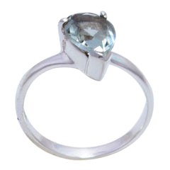 Violet light green solitaire ring with pear-shaped gemstone set on silver band