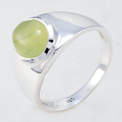 Ayesha light green solitaire ring with a polished silver band and round green gemstone