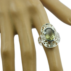 Natcha Light Green Solitaire Ring with Elegant Silver Design