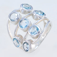 Camila luxurious blue gemstone ring with multiple round blue stones set in silver band