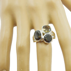 Ivana luxurious brown gemstone ring featuring three faceted brown stones set in silver band