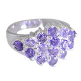 Isabel luxurious purple gemstone ring with multiple round purple stones set in silver band