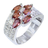 Ivy luxurious red gemstone ring with marquise red stones and pave clear crystals on silver band