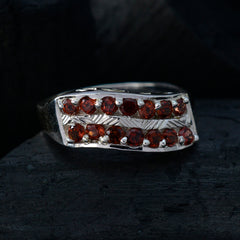 Sofia luxurious red gemstone ring with two rows of deep red stones set in silver band