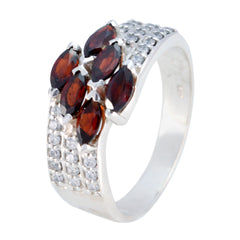 Ivy luxurious red gemstone ring with marquise garnet stones and pave clear crystals on silver band