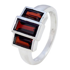 Antonia luxurious red trilogy ring with three rectangular red gemstones set in silver band