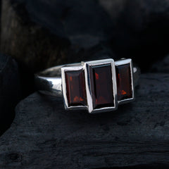Antonia luxurious red trilogy ring with three rectangular red stones set in silver band