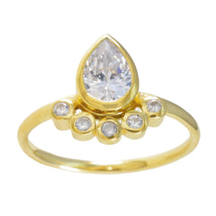 Ji-eun luxurious white gemstone ring with pear-shaped centerpiece and gold band