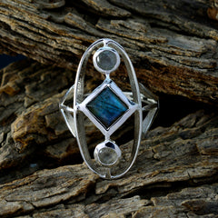 Rosa luxury grey gemstone ring with silver geometric design and blue center stone