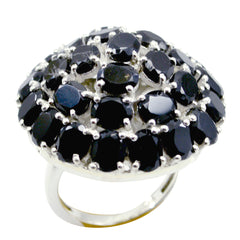 Camilla modern black statement ring featuring clustered black stones on silver band