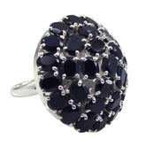 Camilla modern black statement ring with multiple black stones set in silver band