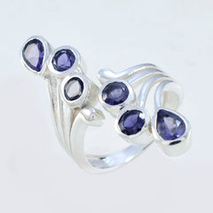 Yasmine modern blue gemstone ring with multiple teardrop-shaped blue stones in silver setting