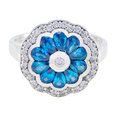 Noelia modern blue gemstone ring with floral design and sparkling clear stones on silver band