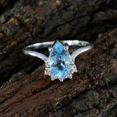 Nari Modern Blue Halo Ring with Pear-Shaped Blue Gemstone