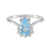Nari Modern Blue Halo Ring with Pear-Shaped Blue Gemstone Blue Topaz Blue