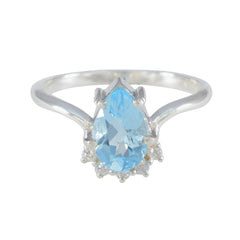 Nari Modern Blue Halo Ring with Pear-Shaped Blue Gemstone Blue Topaz Blue