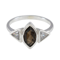 Eun-ji modern brown gemstone ring with marquise cut brown stone and two triangular clear stones