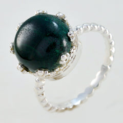 Riya modern green solitaire ring with a round green gemstone and textured silver band