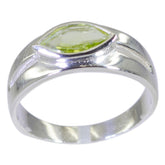 Antonia modern green solitaire ring with marquise-cut green stone and silver band