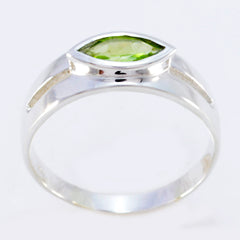 Antonia modern green solitaire ring with marquise-cut green gemstone set in silver band