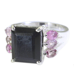 Riya modern multicolor gemstone ring with large rectangular black center stone and pink oval side stones on silver band