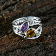 Layla modern multicolor gemstone ring with purple, amber, and green stones set in silver band
