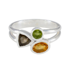 Riya modern multicolor gemstone ring with green, brown, and yellow stones set in silver band