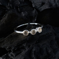 Saanvi modern pink trilogy ring with three round pink stones set in silver band