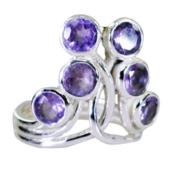 Meera modern purple gemstone ring featuring multiple round purple gemstones in silver setting