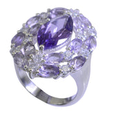 Lucia modern purple gemstone ring with marquise cut center stone and smaller purple accents