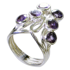 Meera modern purple gemstone ring with multiple oval purple stones set in silver band