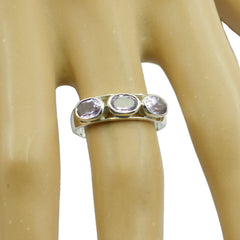 Priya modern purple gemstone ring with three round purple stones set in silver band