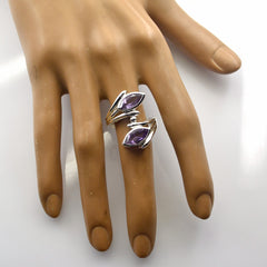 Emily modern purple toi et moi ring with two marquise amethyst stones in polished silver band on hand