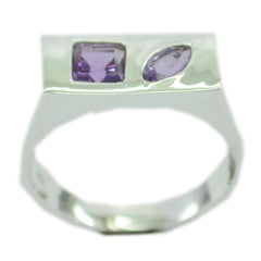 Modern purple toi et moi ring by Laura featuring square and marquise purple gemstones on silver band