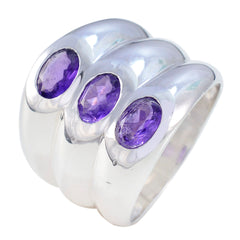 Emily modern purple trilogy ring with three oval purple gemstones set in silver band