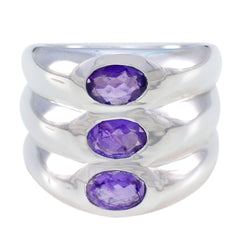 Emily silver modern purple trilogy ring with three oval purple gemstones in a sleek band