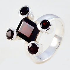 Siti modern red gemstone ring with a square center stone and four round accent stones set in silver