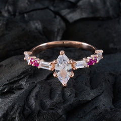 Sophia modern red gemstone ring with marquise center stone and baguette side stones in rose gold