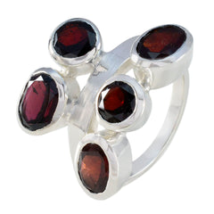 Teresa modern red gemstone ring featuring five faceted red stones set in polished silver band