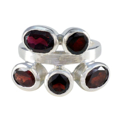 Teresa modern red gemstone ring with five oval red stones set in silver band